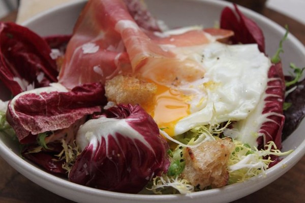 Olive oil poached eggs with Italian chicories and speck