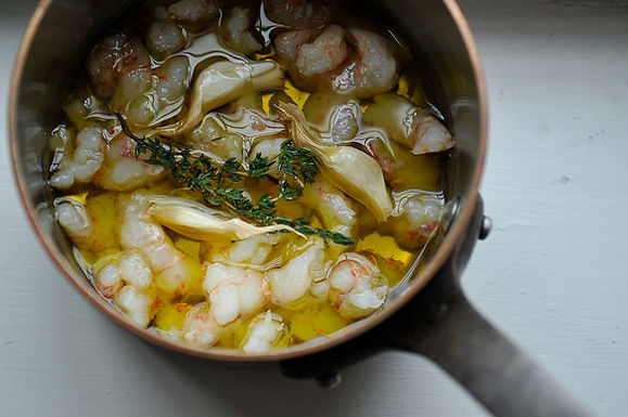 Olive oil poached fish or shellfish