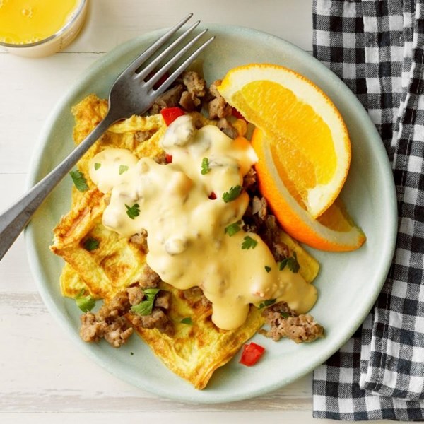 Omelet waffles with sausage cheese sauce