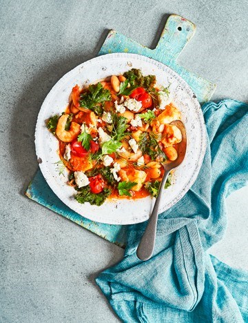 One-pan fish stew with butter beans, kale and feta