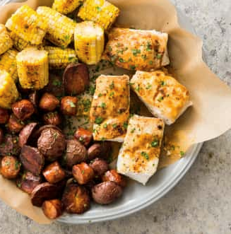 One-pan halibut with red potatoes, corn, and andouille