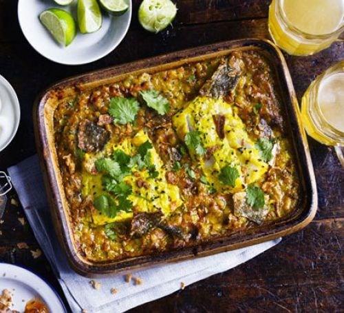 One-pan lentil dhal with curried fish & crisp skin