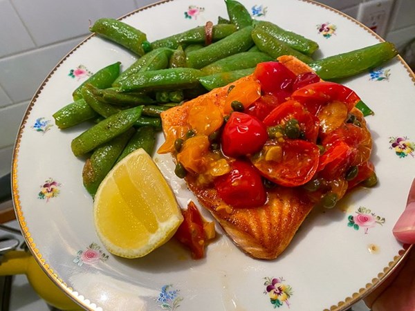 One-pan salmon with sugar snap peas and a cherry tomato sauce