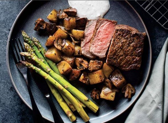 One-pan steak with potatoes, mushrooms, and asparagus
