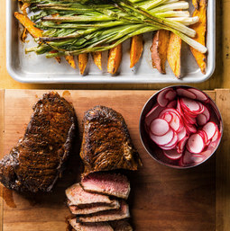 One-pan steak with sweet potatoes and scallions