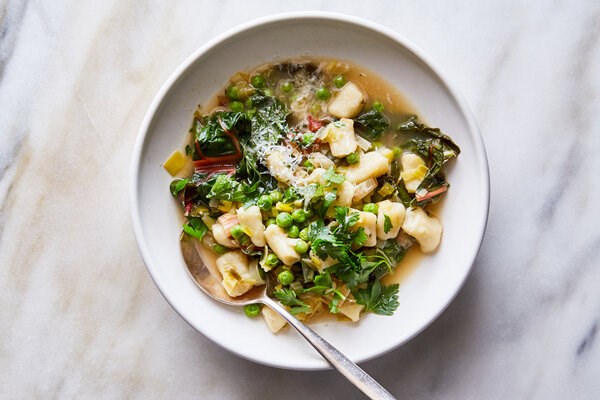 One-pot braised chard with gnocchi, peas and leeks
