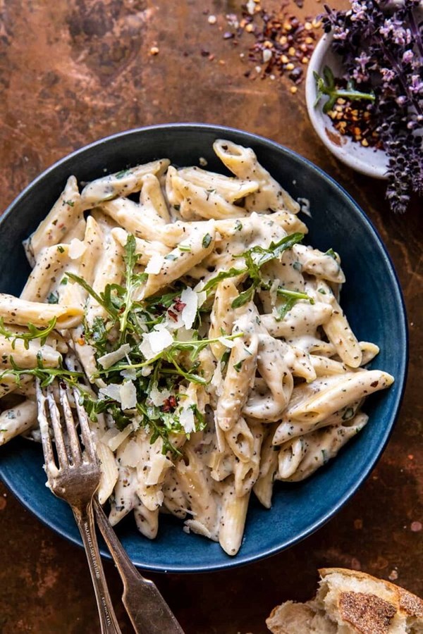 One pot creamy penne Alfredo with spicy arugula