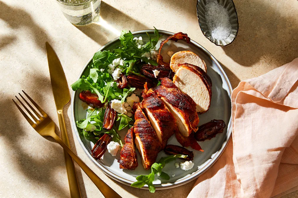 One-skillet bacon-wrapped chicken with dates, arugula & blue cheese