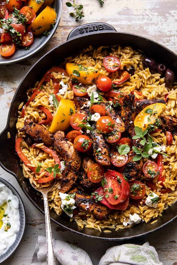 One skillet Greek chicken and orzo with tomatoes, feta, and tzatziki