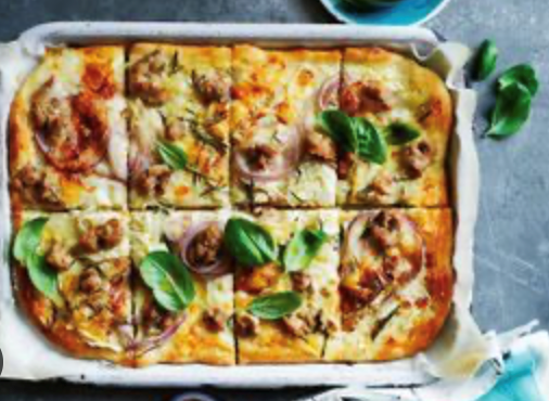 One-tray pizza with sausage and Tallegio