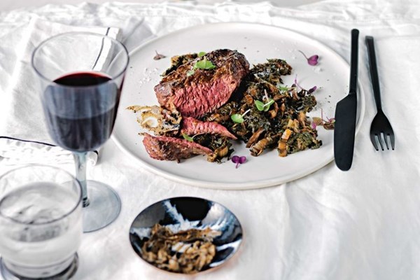 Onglet steak with black garlic butter and silverbeet