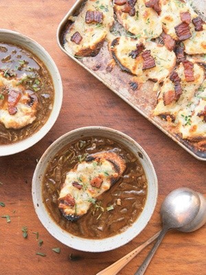 Onion soup with bacon, winter herbs and Gruyère