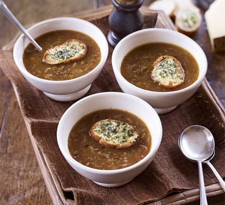 Onion soup with cheese and herb toasts