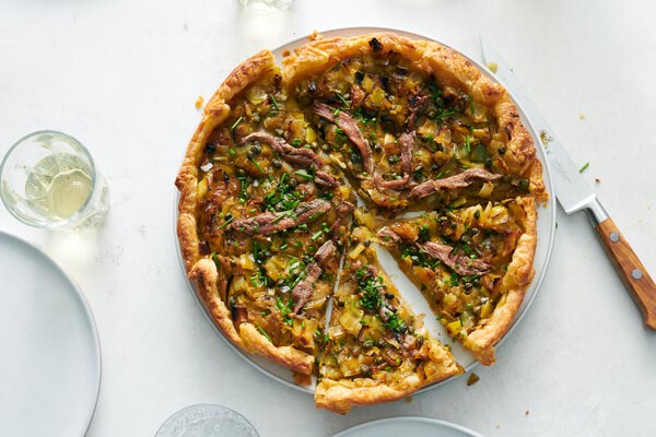 Onion tart with leeks, capers and anchovy