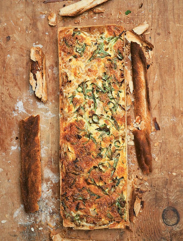 Onion tart with rocket and cheddar