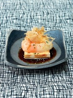 Onsen duck egg on silken tofu with truffle-ponzu sauce 