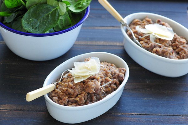 Oozy red lentil ‘risotto’ with red wine & sausages