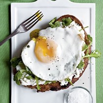 Open-faced sandwiches with ricotta, arugula, and fried egg