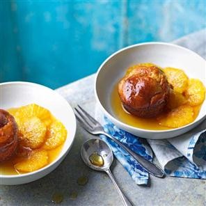 Orange and ginger rum babas with caramelised oranges and ginger cream