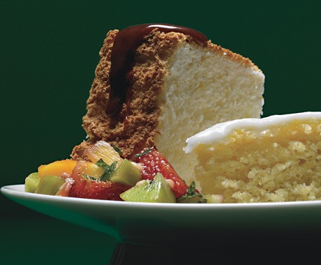 Orange angel food cake with caramel sauce and tropical-fruit compote