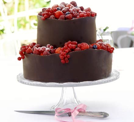 Orange berry wedding cake
