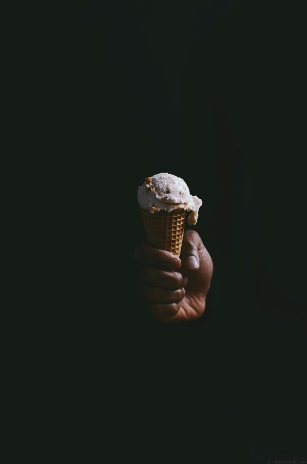Orange blossom clove ice cream with candied blood orange freckles