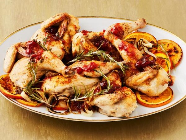Orange-cranberry glazed Cornish hens