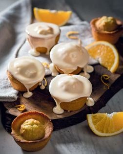 Orange-frosted vanilla queen cakes