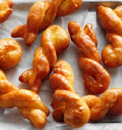 Orange-glazed crullers