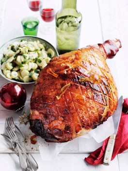 Orange-glazed ham with potato and parsley salad