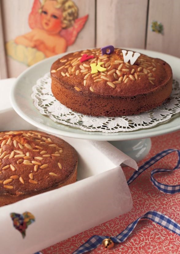 Orange juice and olive oil cake with pine nuts