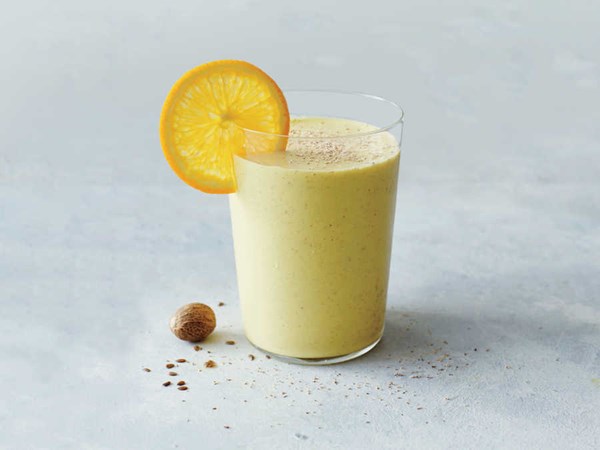 Orange-mango gritty with turmeric and walnuts