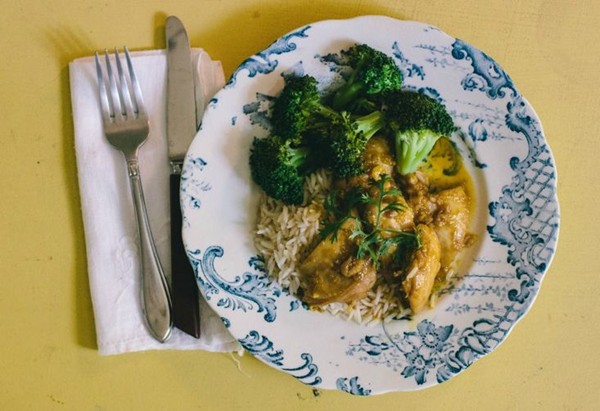 Orange pan-glazed chicken with broccoli and rice