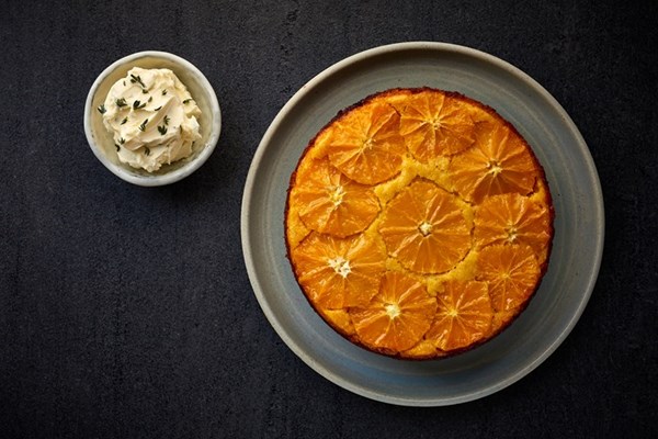 Orange, polenta and olive oil cake with whipped mascarpone and thyme