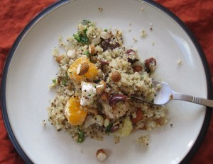 Orange quinoa salad with almonds, olives, and feta