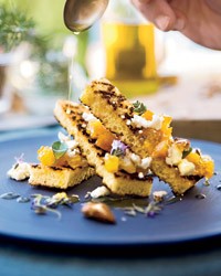 Orange spoon fruit with feta and spiced almonds