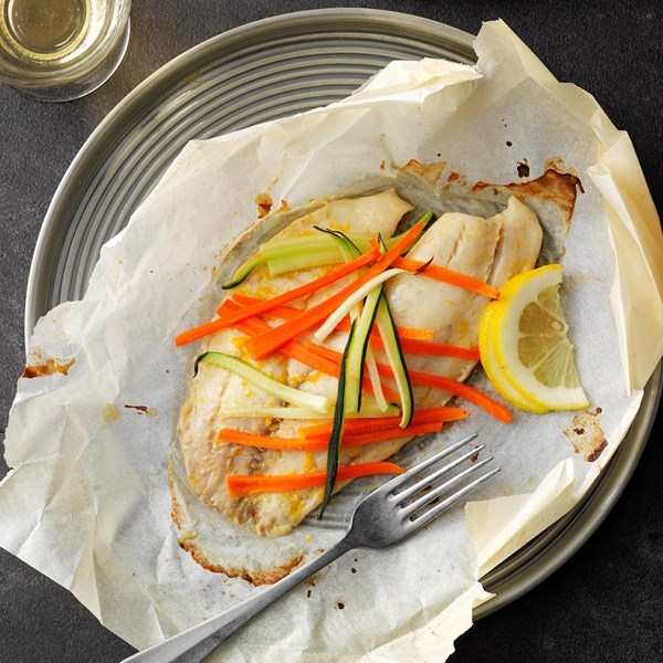 Orange tilapia in parchment