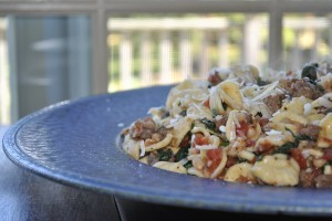 Orchiette with spinach, sausage, white beans, and tomatoes