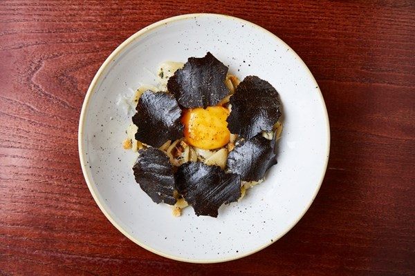 Orecchiette, egg yolk and black truffle
