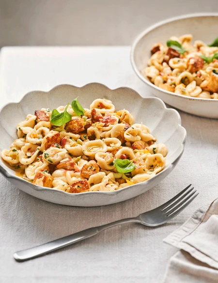 Orecchiette with halloumi and tomato-almond pesto