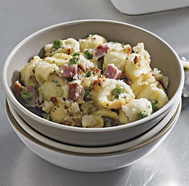 Orecchiette with ham and peas in cheese sauce