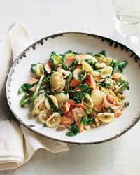 Orecchiette with salmon, arugula and artichokes