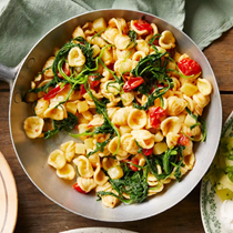 Orecchiette with tomatoes, anchovy, rocket and potato