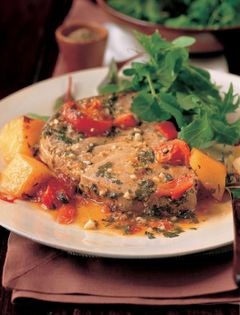 Oregano-baked tuna with tomatoes and golden-brown potatoes