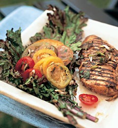Oregano chicken with grilled kale and heirloom tomatoes