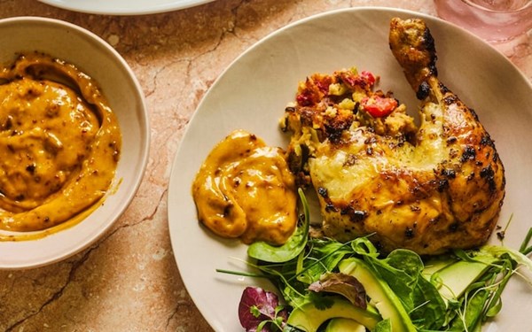 Oregano-roast chicken with roast pepper and sourdough stuffing and smoky chilli aioli