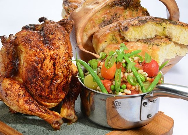 Organic barbecue beer can chicken, summer beans and garlic bread