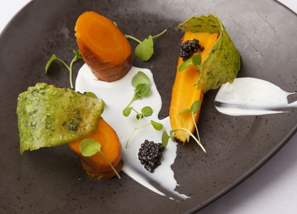 Organic carrots cooked in goat's whey with caviar, watercress and goat's curd