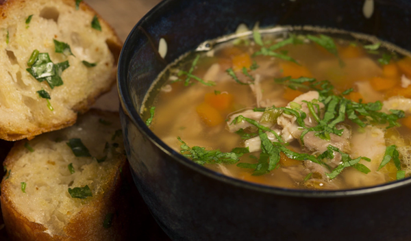 Organic chicken soup with tarragon garlic bread