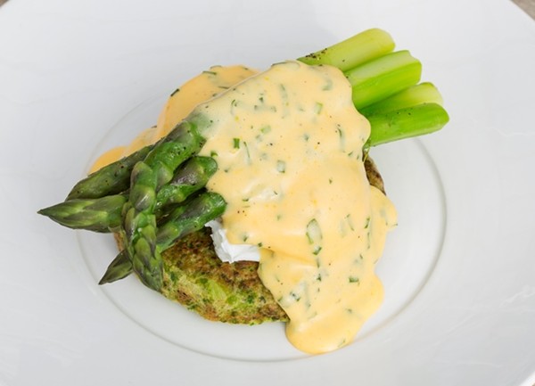 Organic pea pancake, asparagus and poached eggs with a herb sabayon